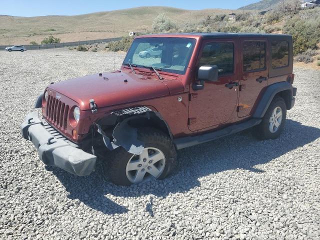 JEEP WRANGLER U 2009 burgundy  gas 1J4GA39199L710352 photo #1