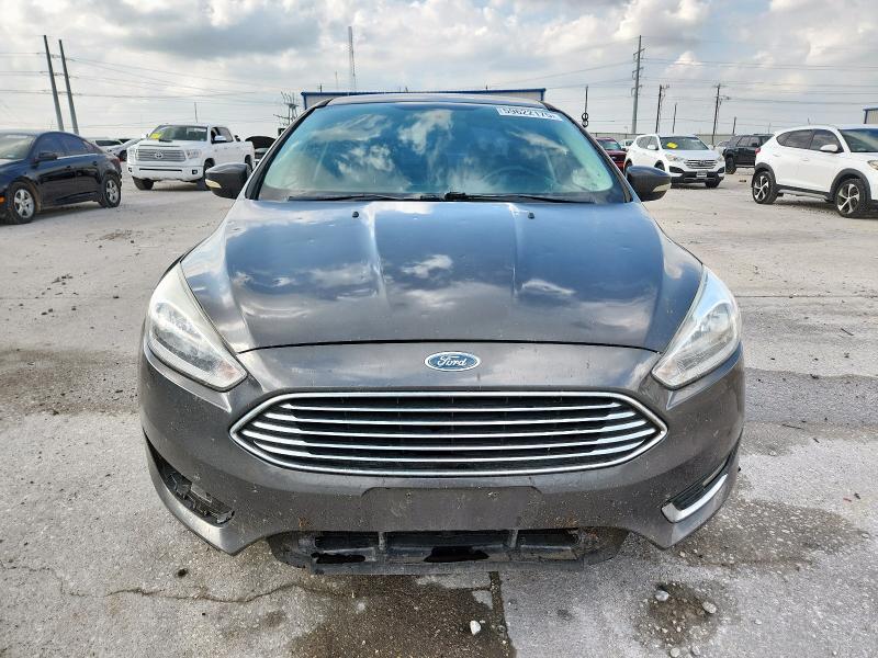 2015 FORD FOCUS TITA 1FADP3J29FL232270