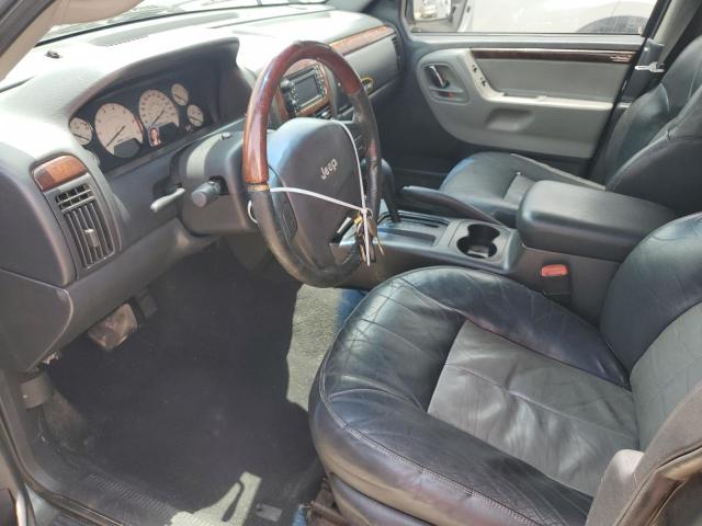 VIN: 1J8GX68J14C167412 Auction: COPART Lot: 59808063 Location: FL - ORLANDO NORTH 1J8GX68J14C167412 JEEP CHEROKEE 2004 GREEN Photo 7