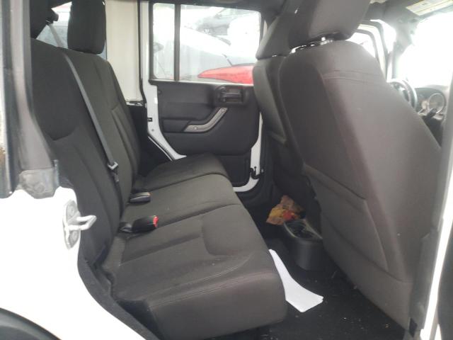 1C4BJWDG8EL320625 Jeep Wrangler Unlimited Sport