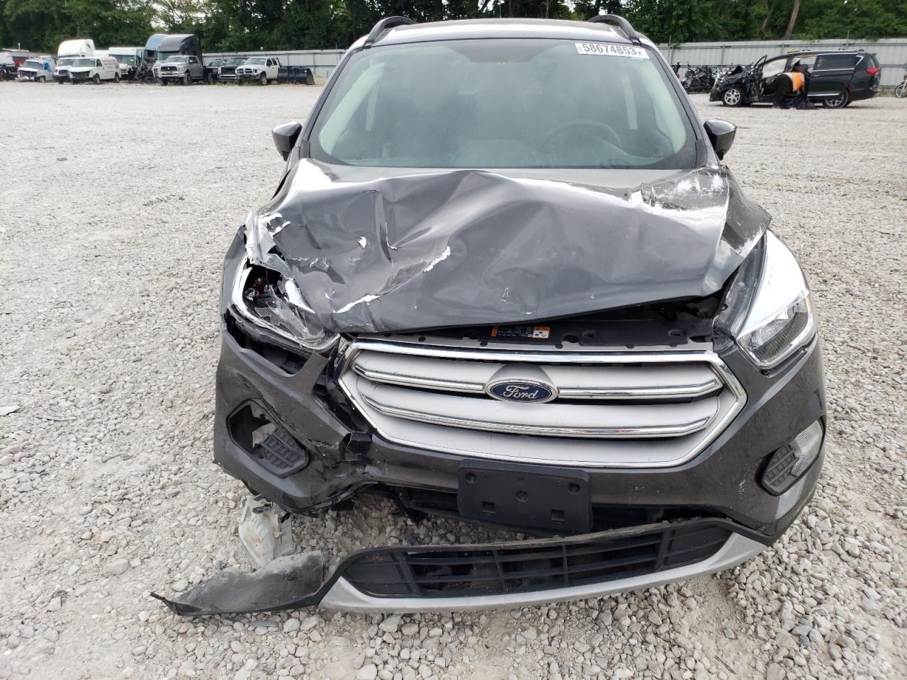 VIN: 1FMCU0GD9JUD20160 2018 FORD ESCAPE