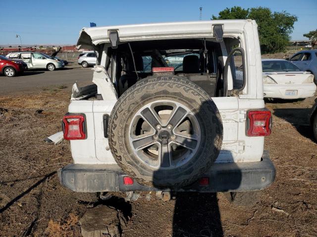 1C4HJXEGXJW124919 Jeep Wrangler Unlimited Sahara