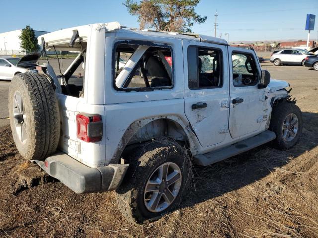 1C4HJXEGXJW124919 Jeep Wrangler Unlimited Sahara