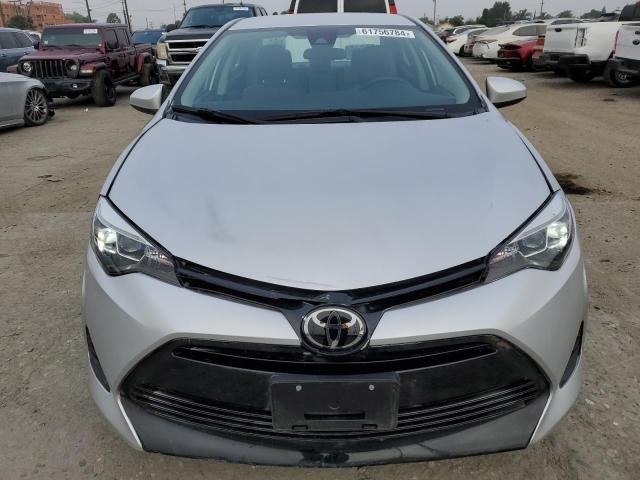 2018 Toyota Corolla L VIN: 5YFBURHE1JP829085 Lot: 61756784