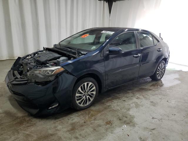 VIN 5YFBURHE9HP693170 2017 Toyota Corolla, L no.1