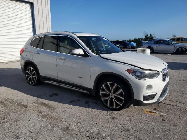 VIN WBXHT3C34H5F67950 2017 BMW X1, Xdrive28I no.4