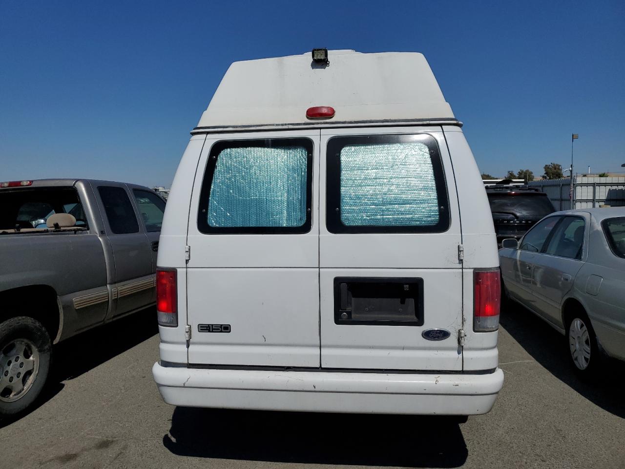 1FTRE1424XHB26920 1999 Ford Econoline E150 Van