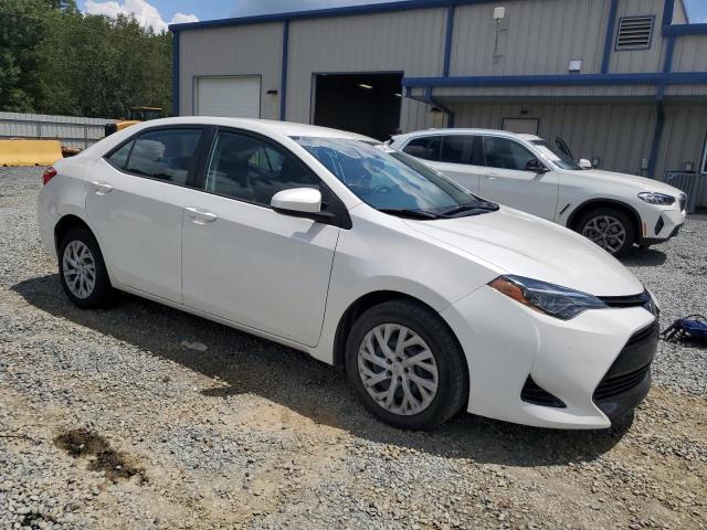 VIN 5YFBURHE4JP855972 2018 Toyota Corolla, L no.4