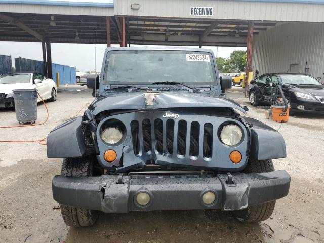 2007 Jeep Wrangler Sahara VIN: 1J4GB59137L207955 Lot: 62242334