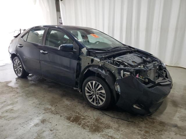 VIN 5YFBURHE9HP693170 2017 Toyota Corolla, L no.4