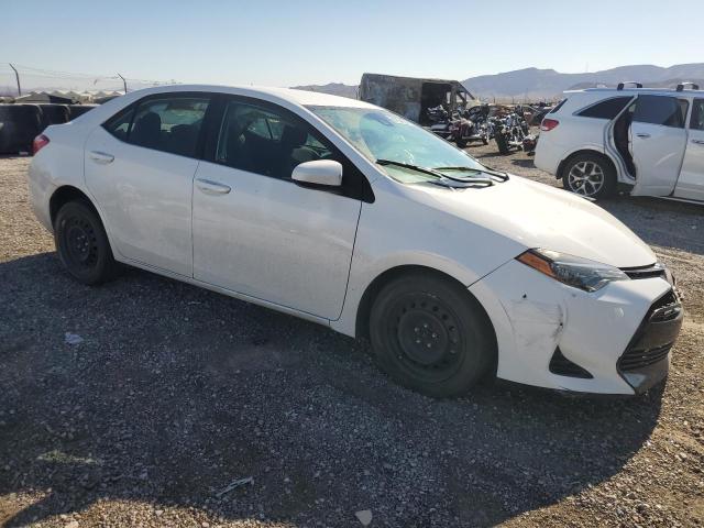 VIN 5YFBURHE5JP836945 2018 Toyota Corolla, L no.4