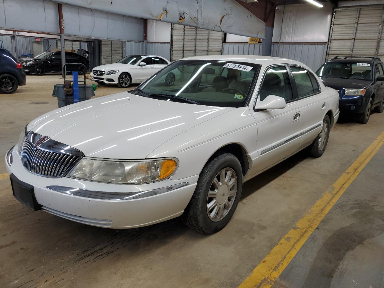 1LNHM97VXXY640379 1999 Lincoln Continental