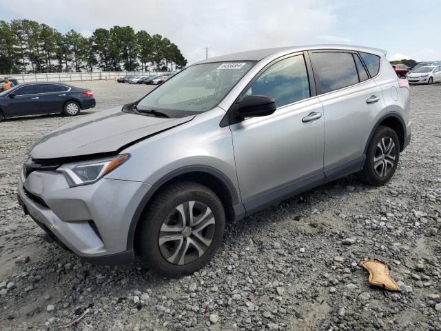 VIN JTMZFREV6JJ195290 2018 Toyota RAV4, LE no.1