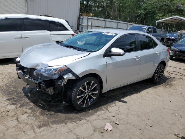 VIN 5YFBURHE3JP794176 2018 Toyota Corolla, L no.1