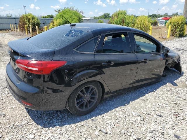 FORD FOCUS SE 2016 black sedan 4d gas 1FADP3F23GL249799 photo #4