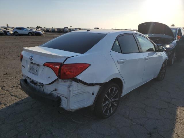 VIN 5YFBURHE2HP643162 2017 Toyota Corolla, L no.3