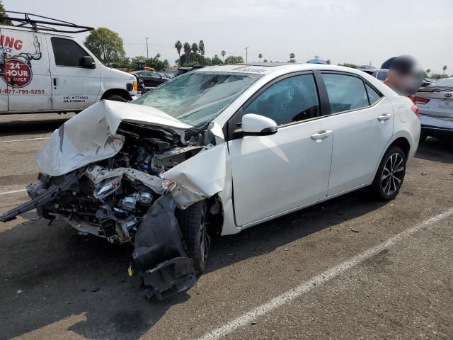 VIN 5YFBURHE7HP639799 2017 Toyota Corolla, L no.1