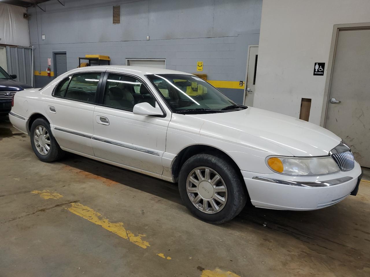 1LNHM97VXXY640379 1999 Lincoln Continental