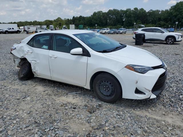 VIN 5YFBURHE6JP800701 2018 Toyota Corolla, L no.4