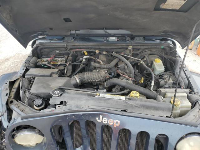 2007 Jeep Wrangler Sahara VIN: 1J4GB59137L207955 Lot: 62242334