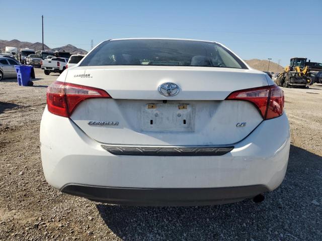 VIN 5YFBURHE5JP836945 2018 Toyota Corolla, L no.6