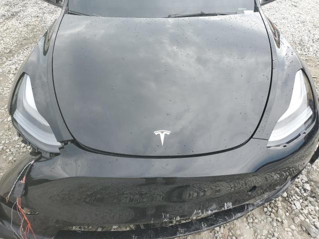 2023 TESLA MODEL Y - 7SAYGDEE9PF895657