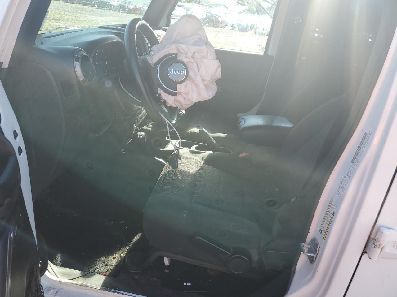 1C4BJWDG9CL130720 2012 Jeep Wrangler Unlimited Sport