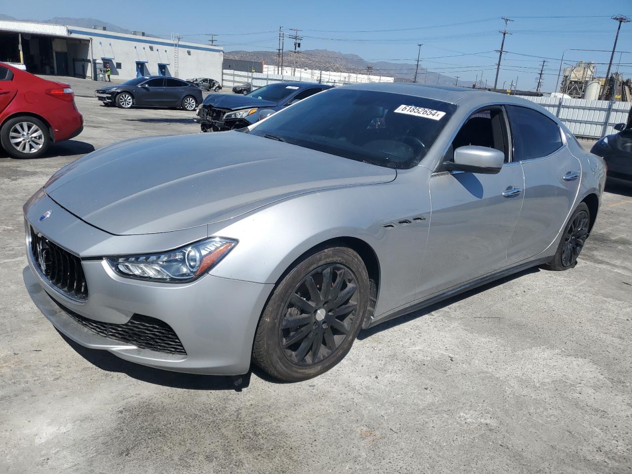 2014 Maserati Ghibli vin: ZAM57XSA9E1089418