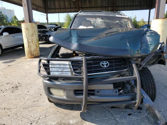 1998 Toyota Land Cruiser VIN: JT3HT05JXW0006977 Lot: 61799514