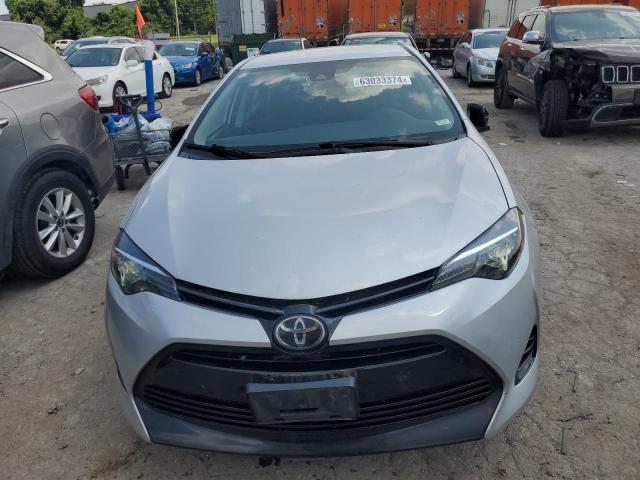 VIN 5YFBURHE5HP641230 2017 Toyota Corolla, L no.5