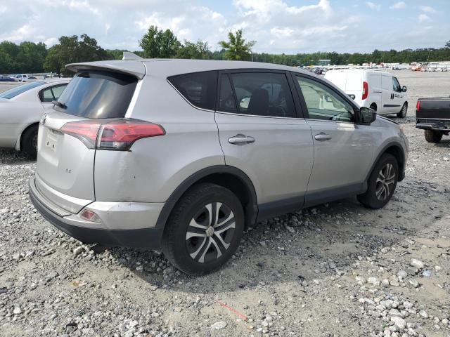 VIN JTMZFREV6JJ195290 2018 Toyota RAV4, LE no.3