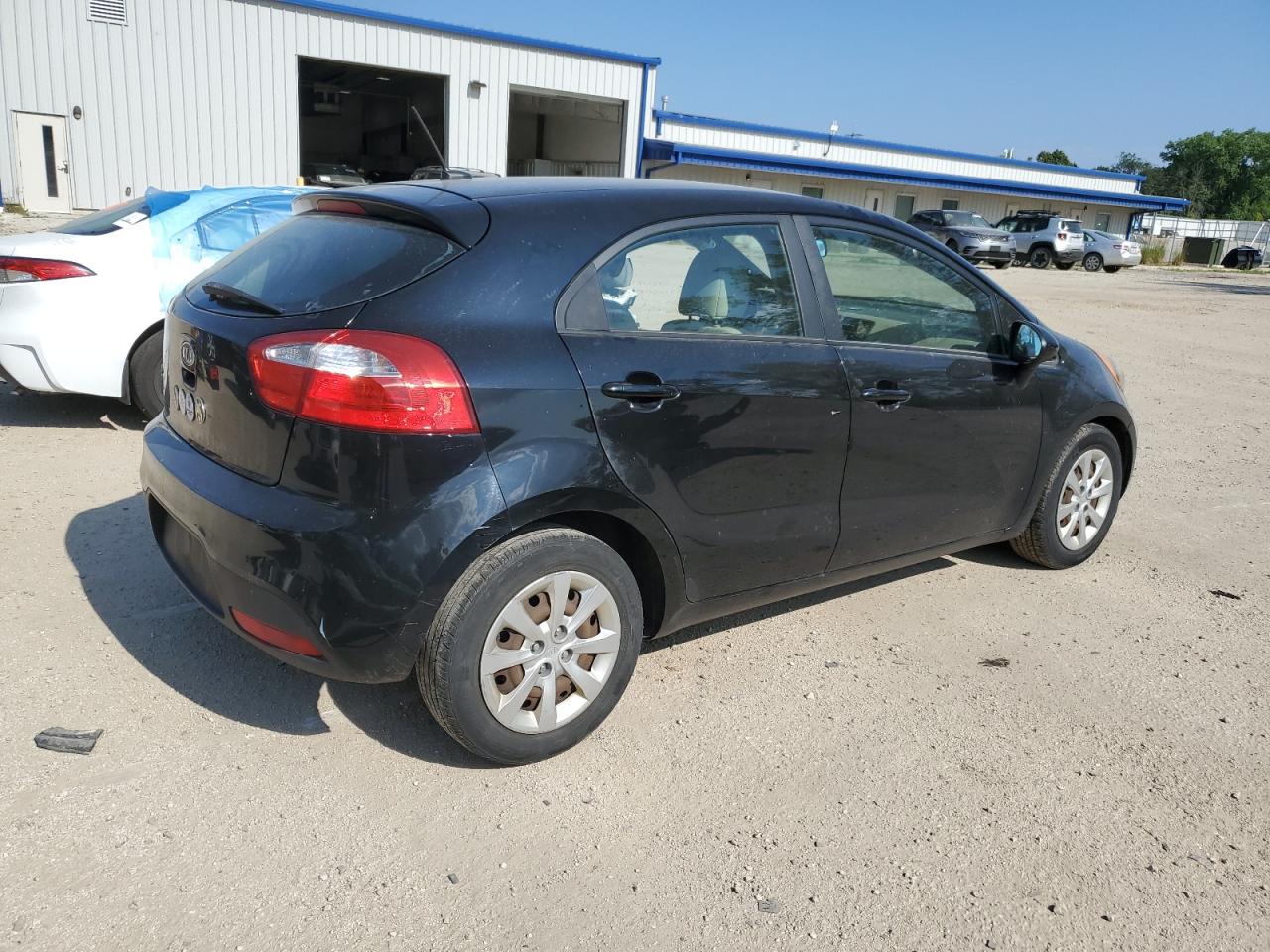 KNADM5A32C6015917 2012 Kia Rio Lx