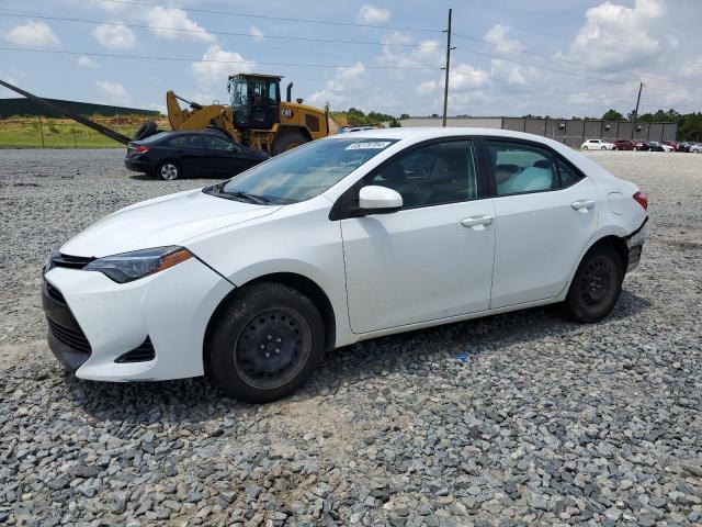 VIN 5YFBURHE6JP800701 2018 Toyota Corolla, L no.1