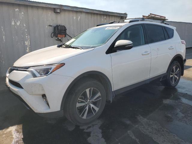 VIN 2T3WFREV2JW516472 2018 Toyota RAV4, Adventure no.1