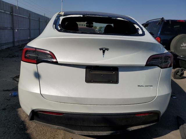 2024 Tesla Model Y VIN: 7SAYGAEE5RF048653 Lot: 63135234