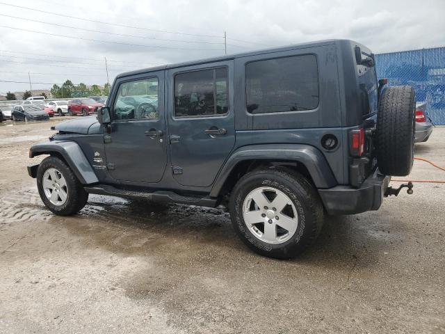 2007 Jeep Wrangler Sahara VIN: 1J4GB59137L207955 Lot: 62242334