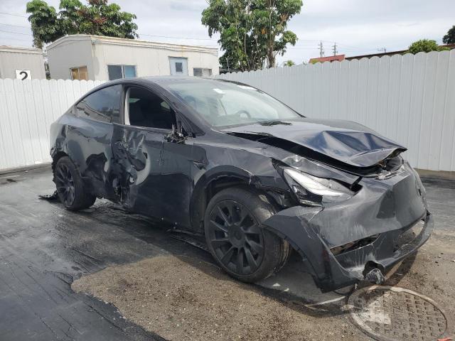 VIN 7SAYGDEE3PA044208 2023 TESLA MODEL Y no.4