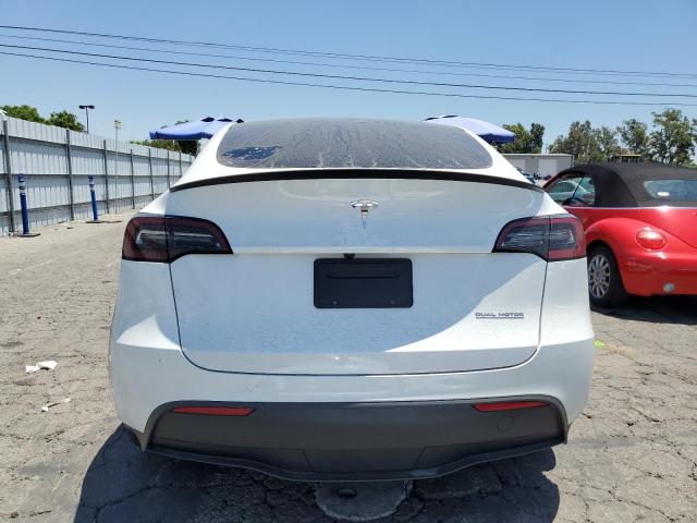 2024 Tesla Model Y VIN: 7SAYGDEF3RF065140 Lot: 60941324