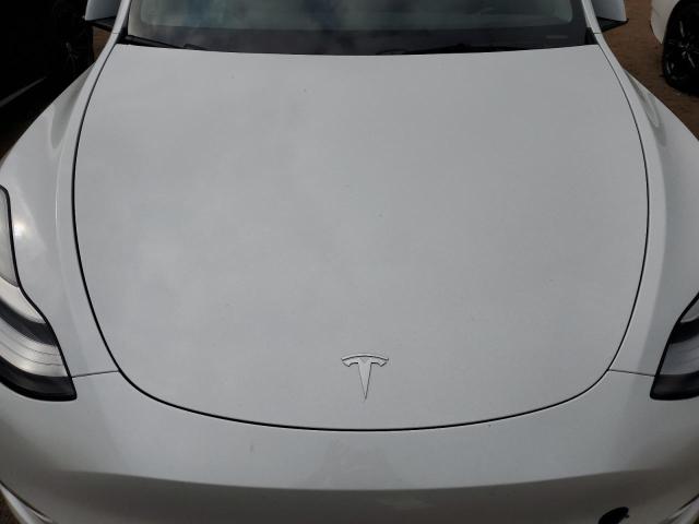 2022 Tesla Model Y VIN: 7SAYGDEE0NF321218 Lot: 61753654