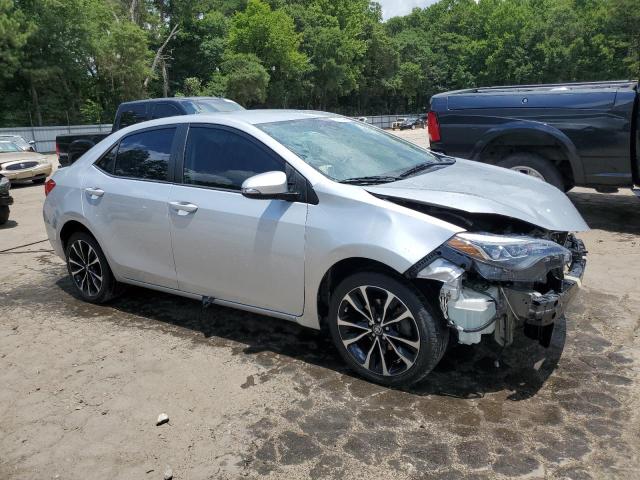 VIN 5YFBURHE3JP794176 2018 Toyota Corolla, L no.4