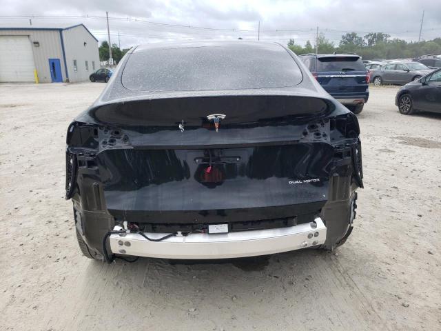 2023 Tesla Model Y VIN: 7SAYGDEEXPA205699 Lot: 62096464