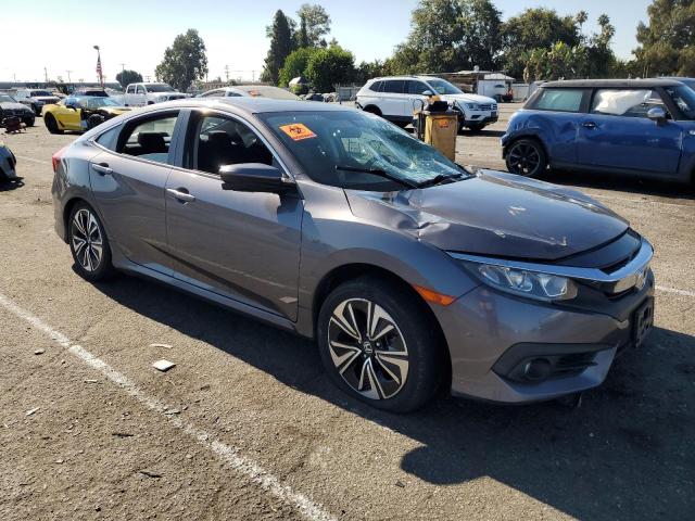 VIN 2HGFC1F31HH631857 2017 Honda Civic, EX no.4