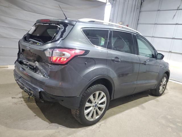 2017 FORD ESCAPE TIT 1FMCU9JD2HUD32383