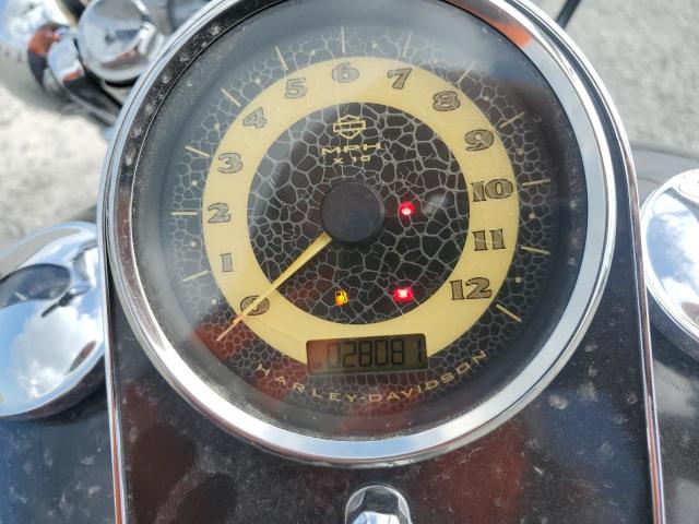 2011 HARLEY-DAVIDSON FLSTN 1HD1JD519BB047561