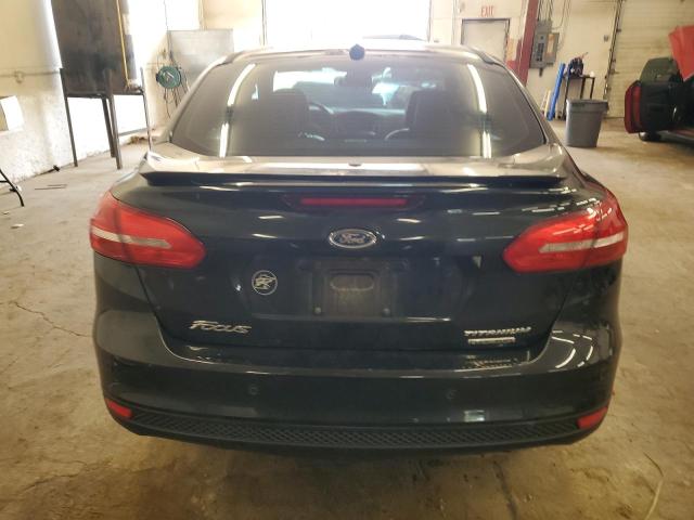 2015 FORD FOCUS TITA 1FADP3J24FL348993