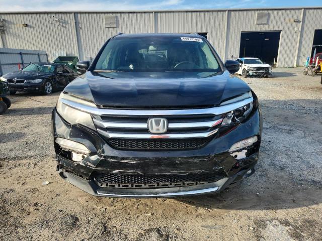 2016 HONDA PILOT TOUR 5FNYF5H91GB030038
