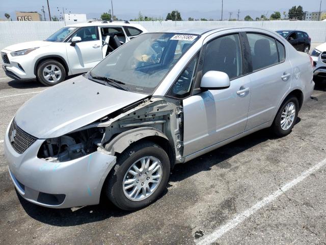 SUZUKI SX4 LE 2012 silver  gas JS2YC5A33C6304303 photo #1