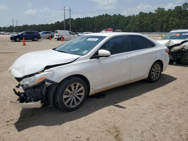 Vin: 4t1bf1fkxhu364464, lot: 63050255, toyota camry le 2017 img_1