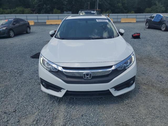 2018 HONDA CIVIC 4D E JHMFC1F79JX012425