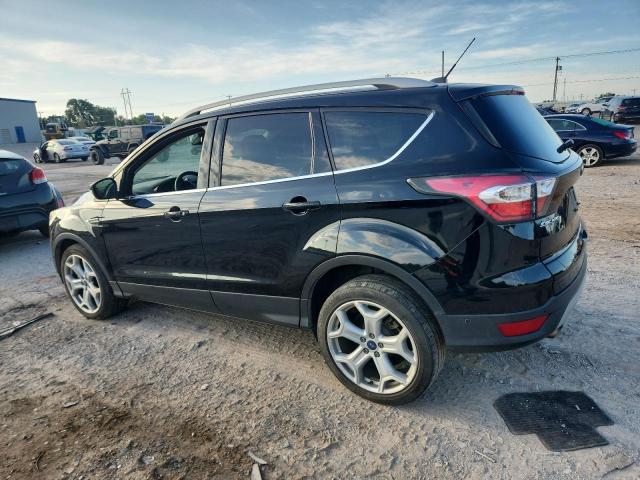 2017 FORD ESCAPE TIT - 1FMCU0J94HUB23542